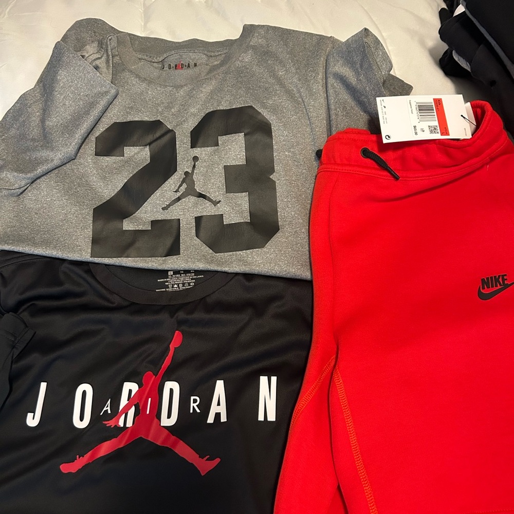 Jordan Kids Tees Nike tech shorts. Nike Jordan sweatpants nike socks Nike hoodie